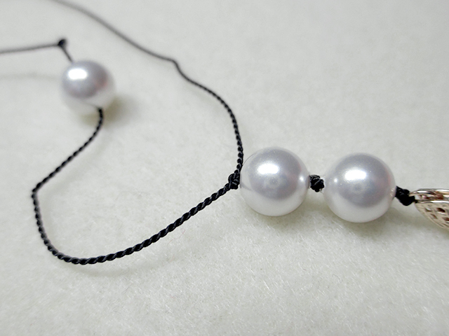 Knotting Pearls with a Clasp Step 7