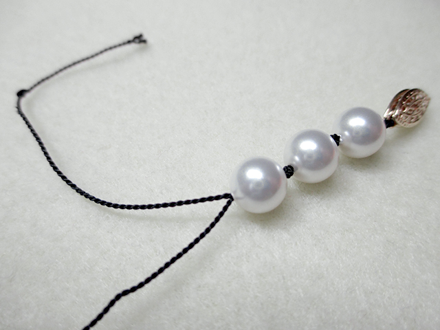 Knotting Pearls with a Clasp Step 8