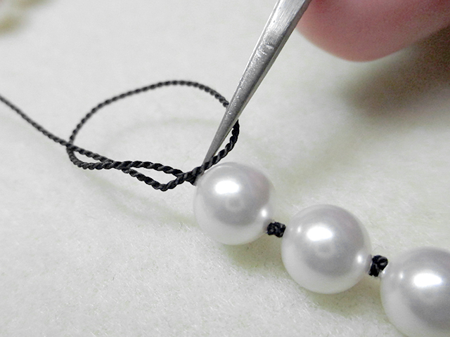 Knotting Pearls with a Clasp Step 10