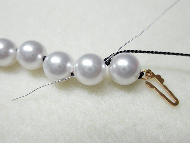 Knotting Pearls with a Clasp Step 18