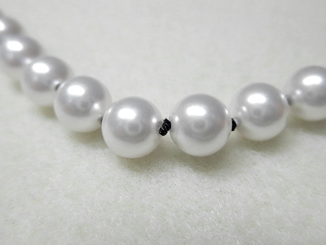 Knotting Pearls with a Clasp Step 19
